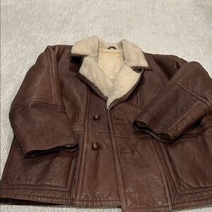 Men’s vintage brown leather shearling coat. Good condition